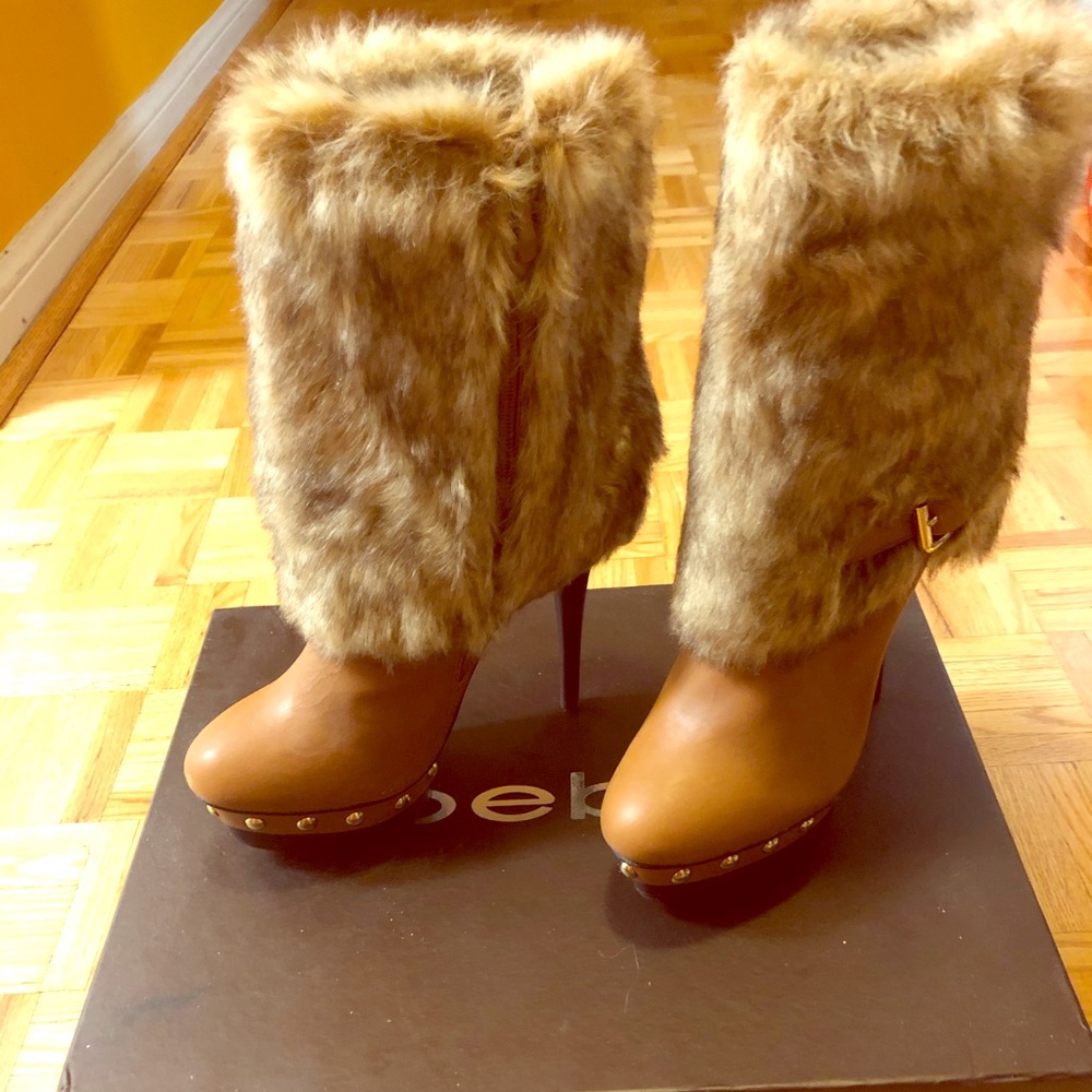 Leather brown Bebe boots with faux fur